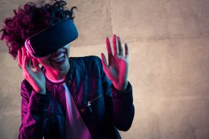 Virtual reality goggles woman laughing